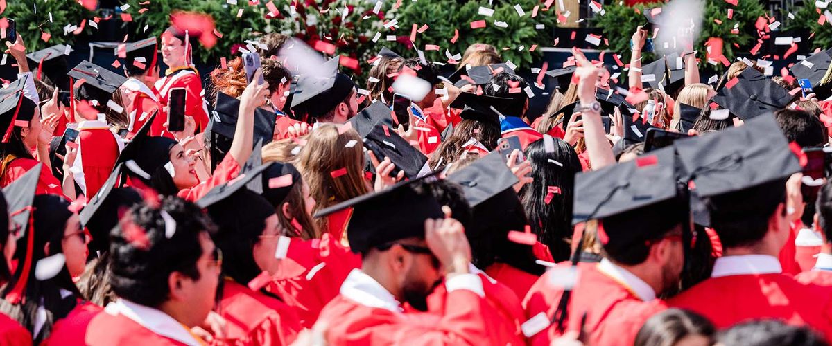 New Gfsntracker Alumni wearing caps and gowns at commencement